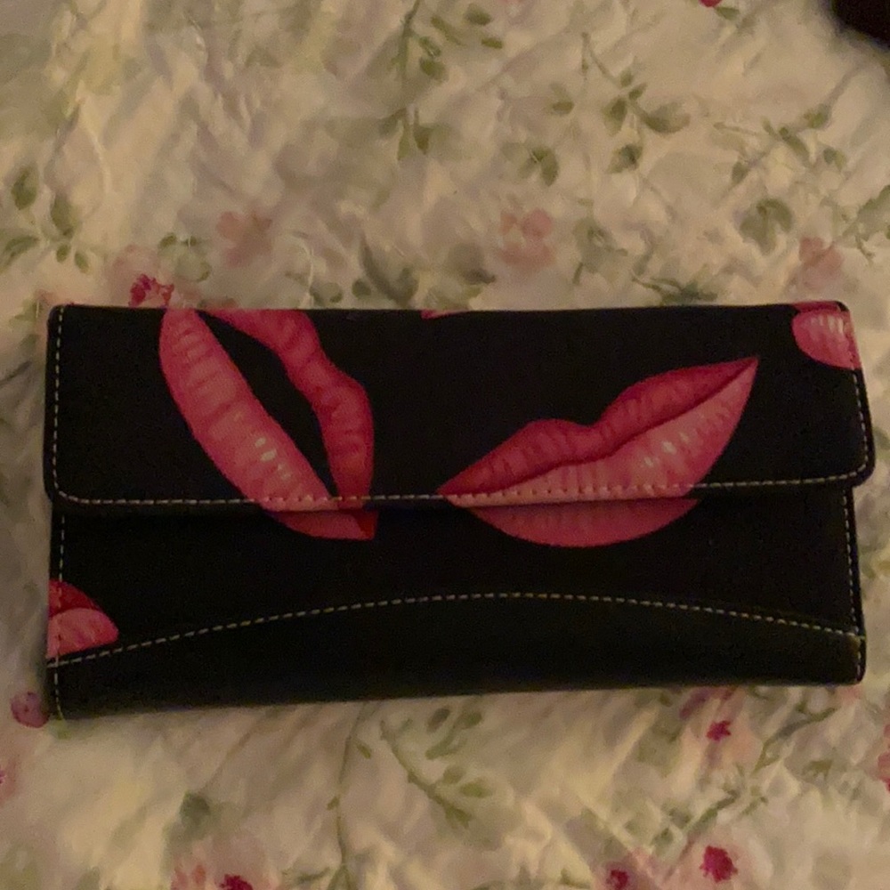Pink and black  lips wallet  gently used
